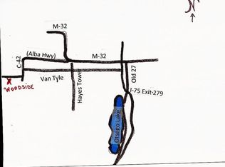 11560 Woodside Dr, Elmira, MI 49730