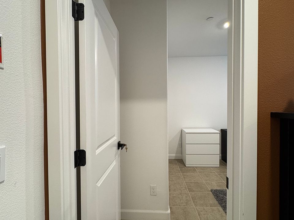 Next to front gate/garage for easy entry access