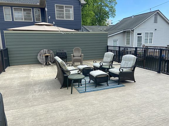 Huge outdoor roof patio accessible from the living room