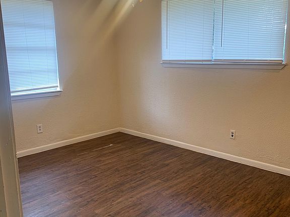 View of bedroom facing the front of the house and next to bathroom.