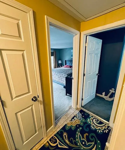 Upstairs hall w/linen closet, pull down for attic.
