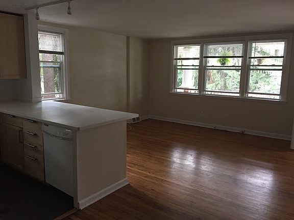 Living room area with 4 windows