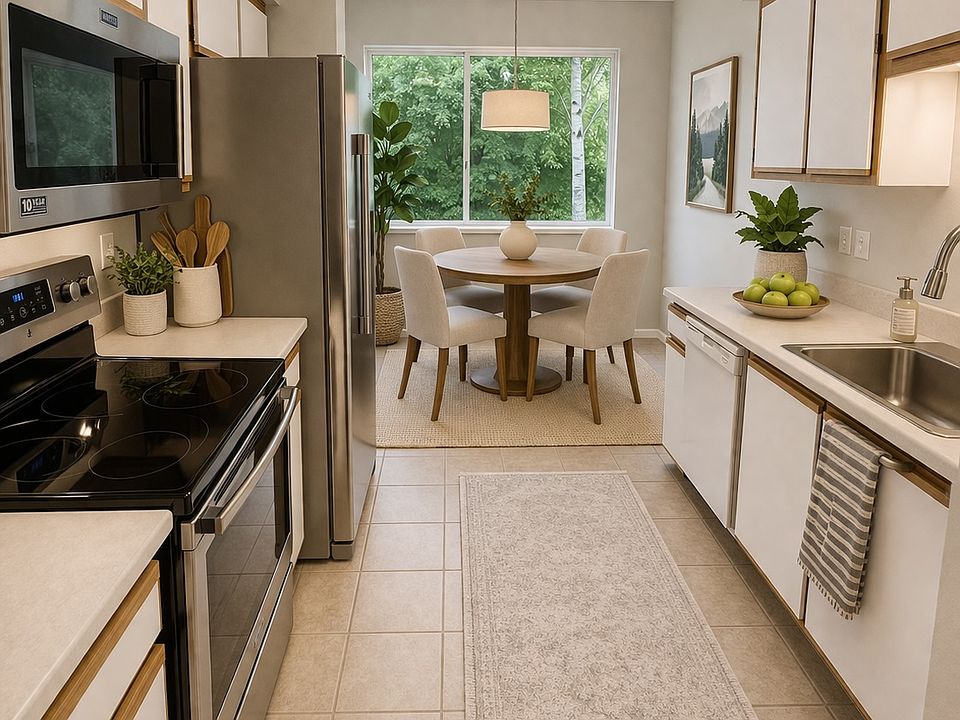 Tile floors, stainless steel appliances, purchased last year. (Photo does not show new stainless steel dishwasher recently installed.)