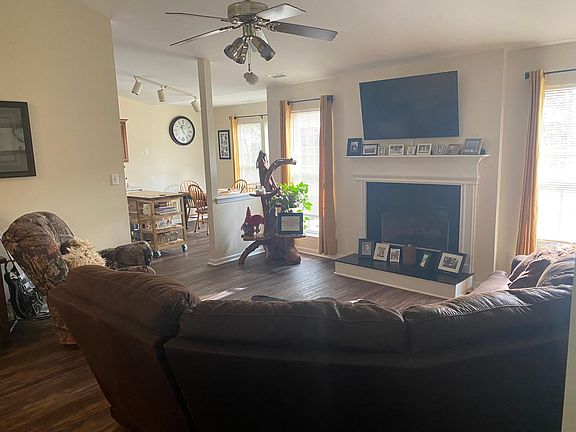 Living room looking into eat in kitchen