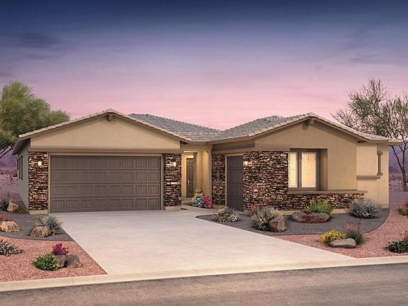 The Patagonia with exquisite stone on the exterior of the home with an attached 3 car garage.