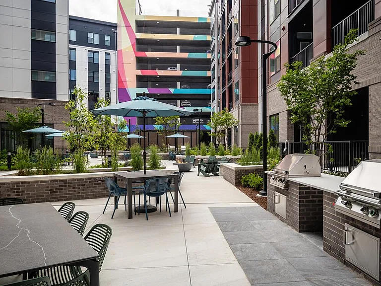 Courtyard #3 with fire pits, BBQ grills, and lounge areas