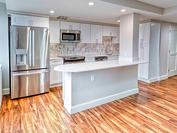 Modern kitchen with stainless steel appliances