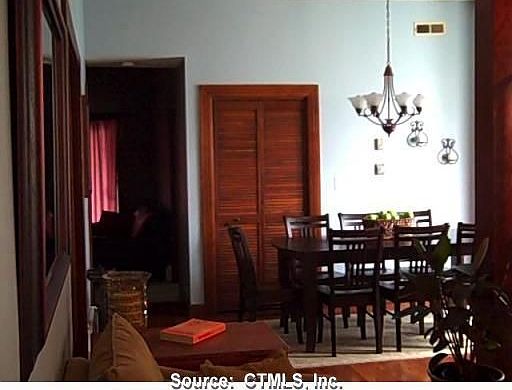 Dining room. Open door leads to den.