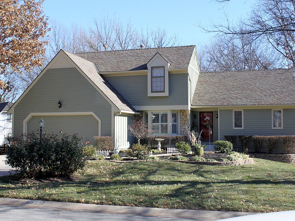 Great home with magnificent landscaping settled on a private treed lot