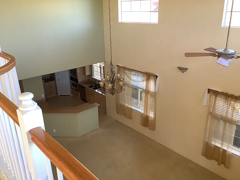 view from loft down to kitchen