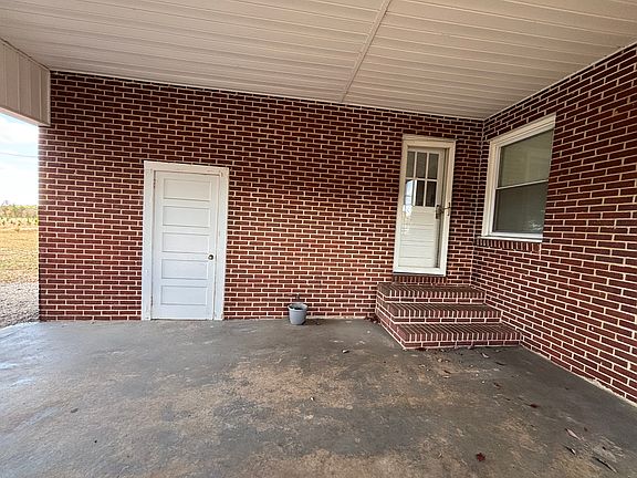 Carport storage and entrance door