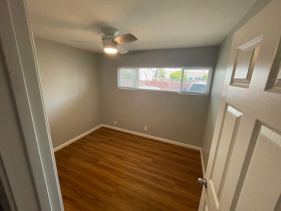 Bedroom 2: New floors, fixtures, and windows