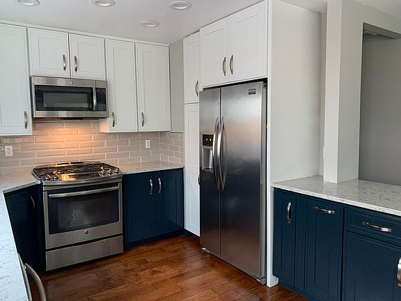 Updated kitchen with quartz counters (refrigerator INCLUDED)