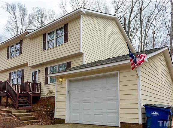 Front of duplex. Unit A is attached to single car garage.