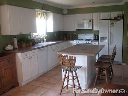 Kichen, from Eat-in area : Large kitchen, modern appliances, recessed lighting, tile floor, eat-in a