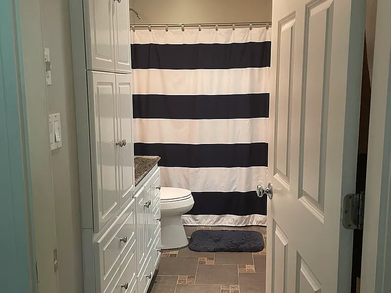 Bathroom with full tub
