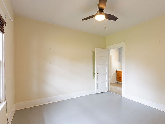 Softwood floors and ceiling fans in both bedrooms
