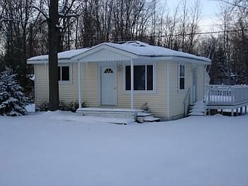 Here is a winter view of this adorable cabin