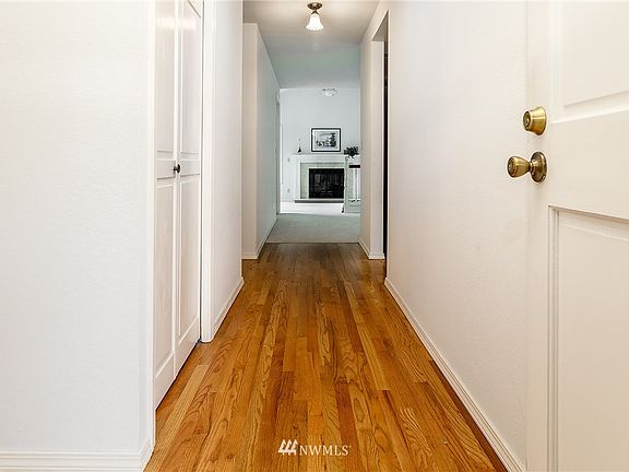 Beautiful hardwood floors and an abundance of natural light greet you.