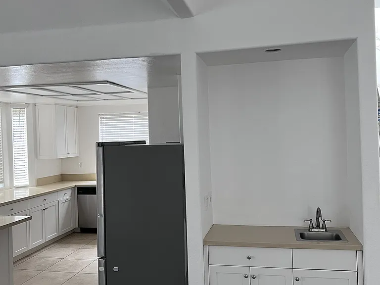 Wet bar near kitchen