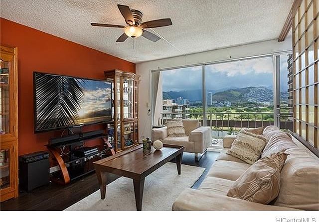 Very comfortable living room right off of kitchen and separated from the bedroom by sliding shoji screens.  Spectacular view towards Manoa, the Ala Wai and the golf course.