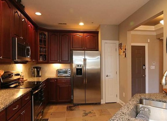 Tons of storage in cabinets and pantry.