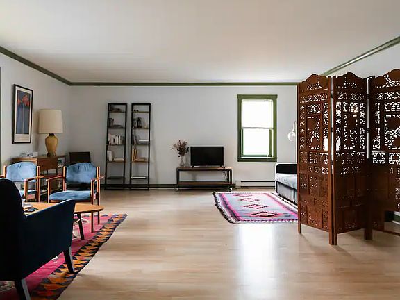 Massive living room - the television has Roku, so you can watch all your favorite shows from Hulu, Netflix, Disney+, whatever you're into