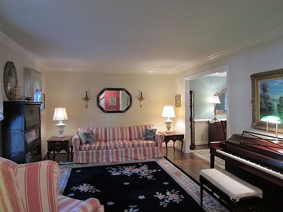 Living Room With Hardwood Floor, Moulding