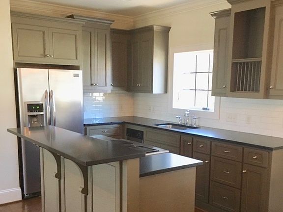 Subway tile kitchen with stainless steel appliances