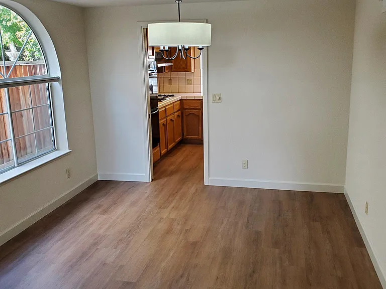 Formal dining room area with crown molding ceiling