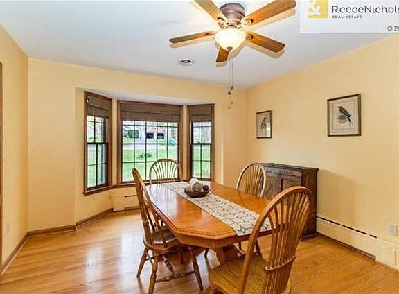 Large dining room with a charming bay window.