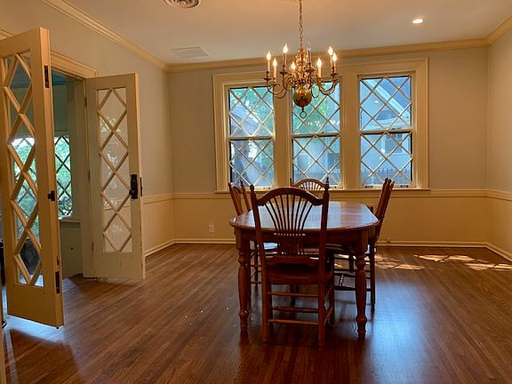 Dining room with attached sunroom
