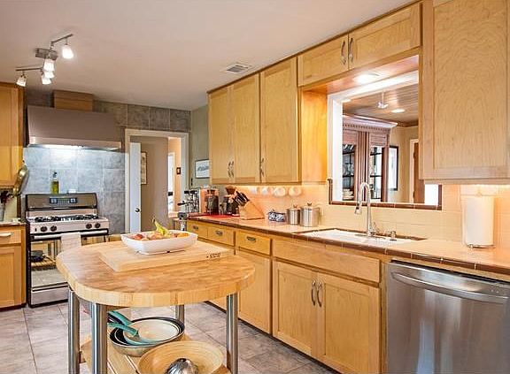 big kitchen with all nice appliances pictured