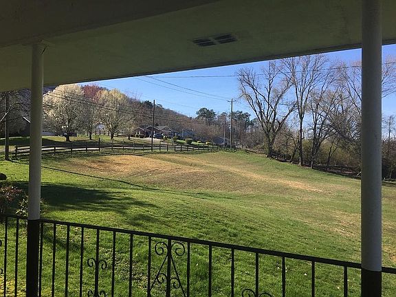 View from carport of field.