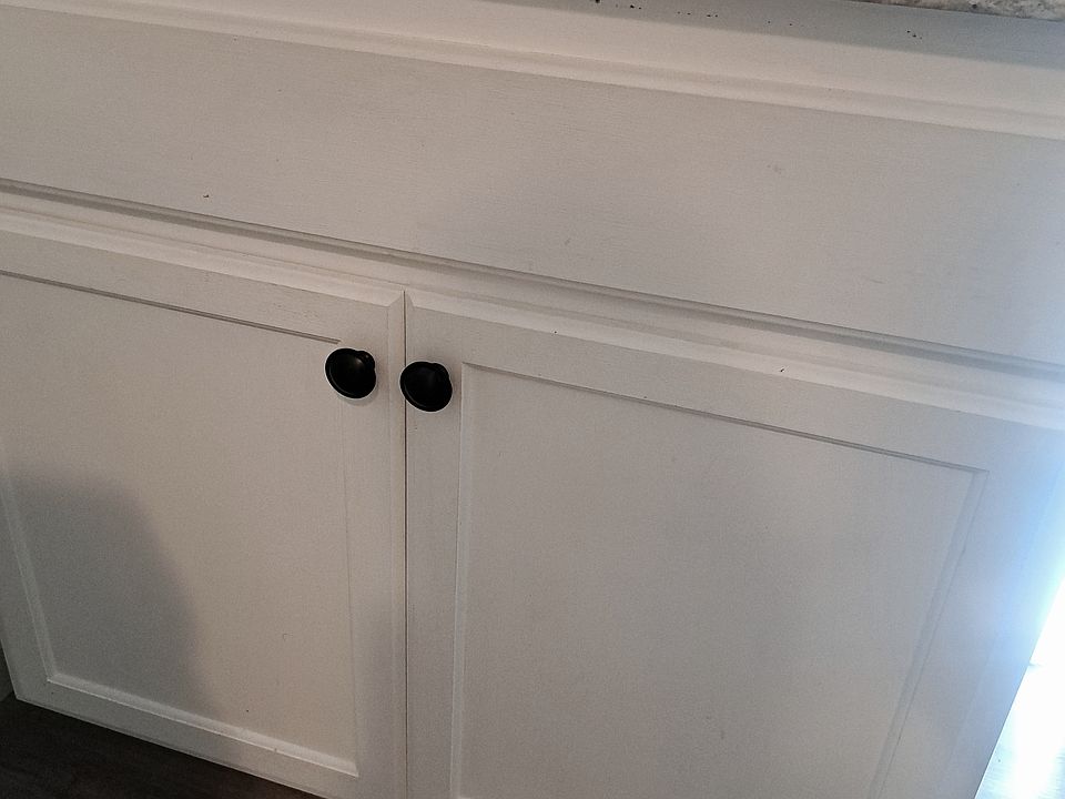 Granite counters, brand new sink, and sink cabinet