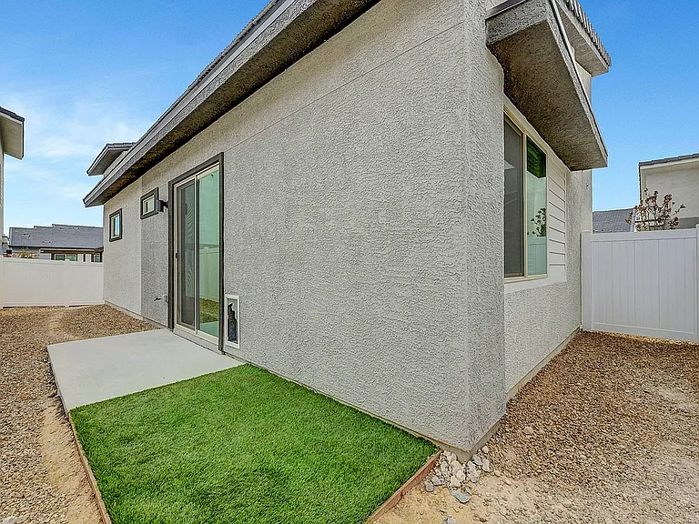 Step into tranquility with this cozy patio, perfect for relaxation and outdoor enjoyment.