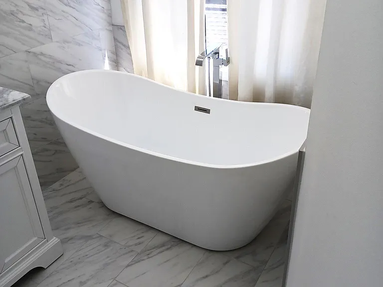 Indulge .Take a soak in this special order bathtub with free standing bathtub faucet.
