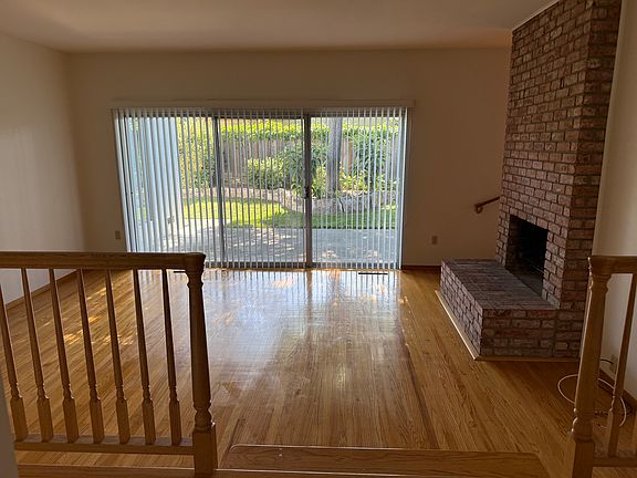 Front entryway view into living room and backyard.
