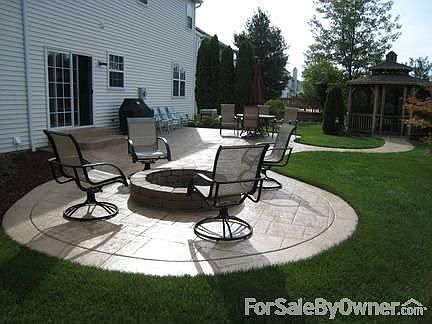 Stamped Concret Patio with Screen Gazebo : The Swimming Pool is out of sight of camera. Fire Pit nic