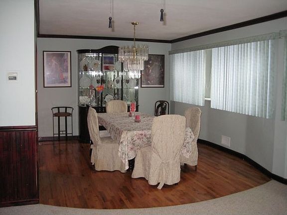 Large and bright dining room with wonderful hardwood floors.