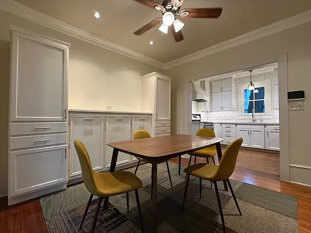 Dining Room has excellent built-in storage. Alarm system is installed and its touch screen is visible at the right. Monitoring or not will be up to the tenant.