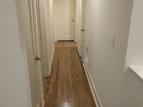 Corridor leading to all 3 rooms on the main floor