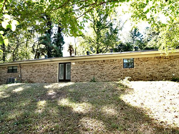 Large shaded back yard patio