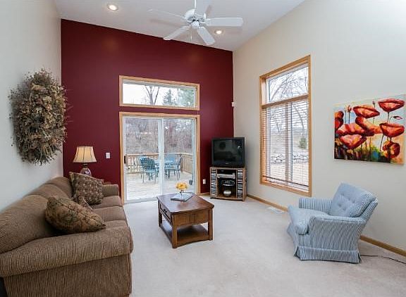 Big living room with access to the back yard and deck!