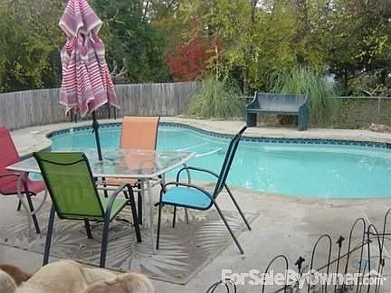 Pool and a Backyard with two decks
						:
						A place for the faimly to hang out and BBQ