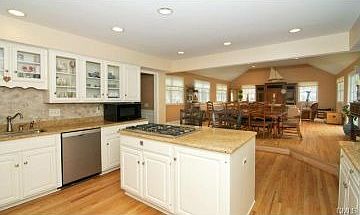 Open kitchen leads into large family room