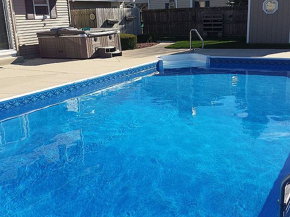 In ground swimming pool. 