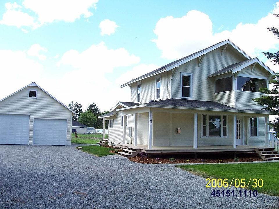 Front exterior with garage.