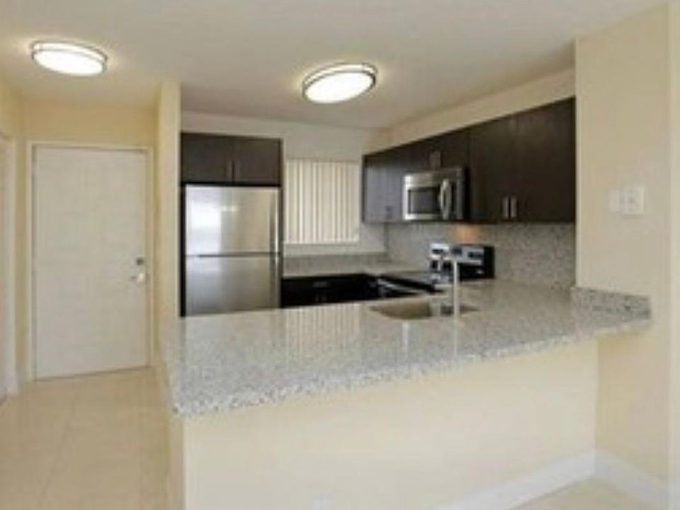 1st image of 8560 N Sherman Cir APT 206