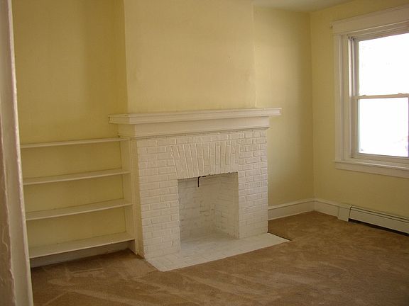 Living room w/brick fireplace
